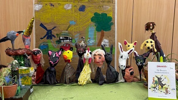 Handpuppen und das Buch zu den Stadtmusikanten